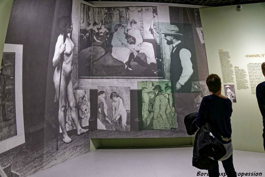 Lautrec dans son atelier en compagnie d'un modèle, devant son tableau "Au Salon de la rue des Moulins" et d'autres toiles. Vers 1894