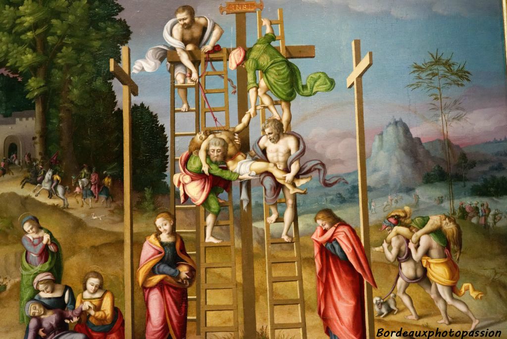 Huile sur bois (détail) À droite Saint Jean pleurant de profil, plusieurs groupes de figures à l'arrière-plan.