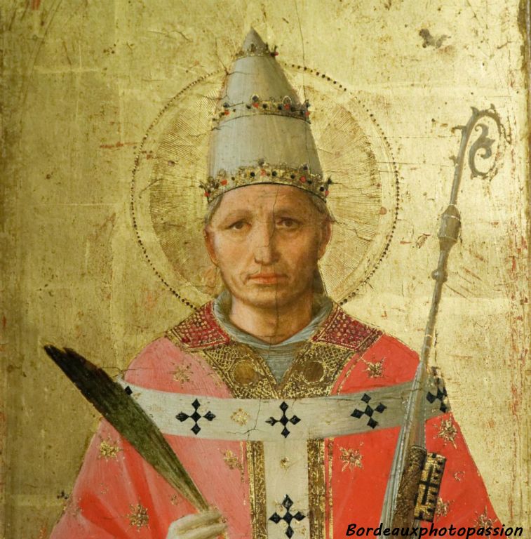 Ce tableau représente un saint pape portant la tiare et tenant la palme du martyre.