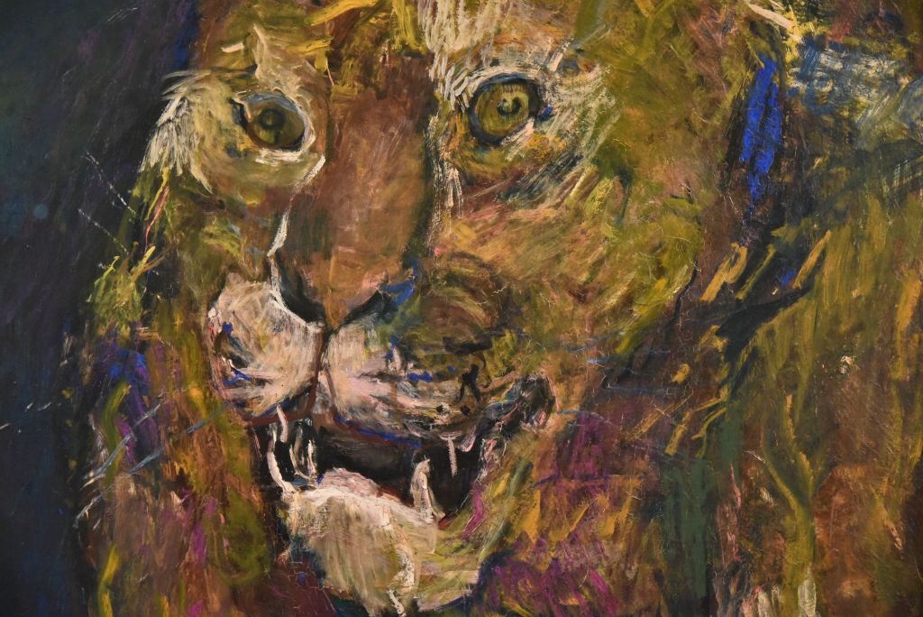 Le peintre imagine ce tigron libéré de sa captivité dévorant une antilope. La puissance des coups de pinceau révèle ici la férocité de l'animal défiant du regard celui qui l'observe.